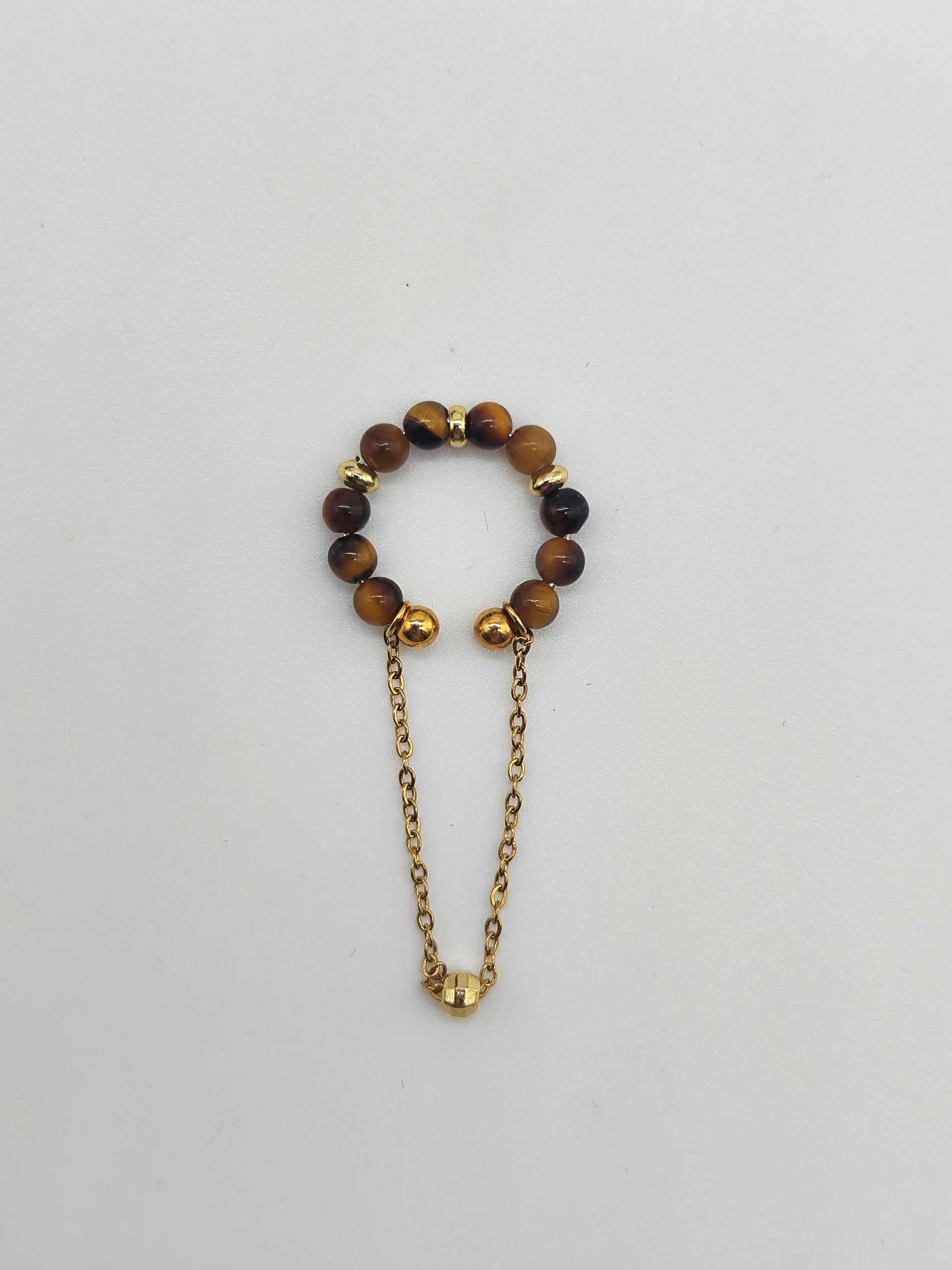 Ear Cuff Ojo de Tigre – Acero Inoxidable y Ajustable