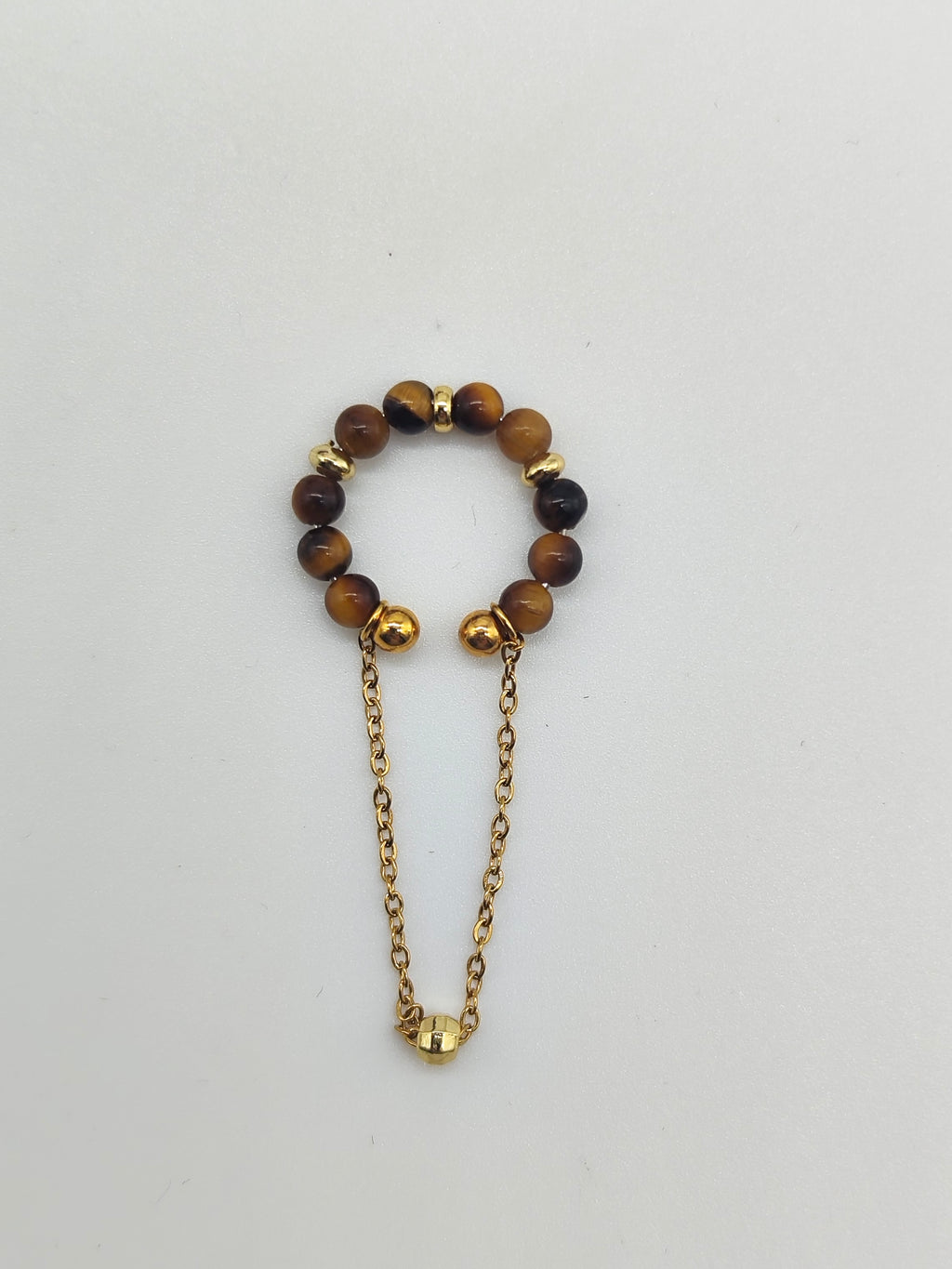 Ear Cuff Ojo de Tigre – Acero Inoxidable y Ajustable