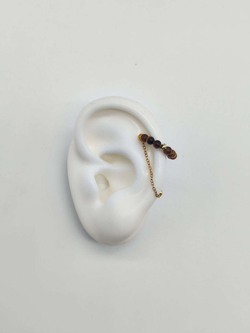 Ear Cuff Ojo de Tigre – Acero Inoxidable y Ajustable